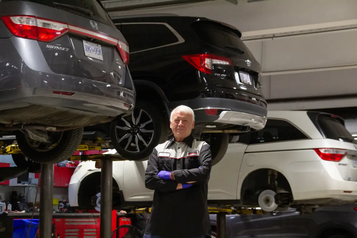 Oil change service being performed on a vehicle at WestWoodHonda